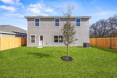 Back of house with a yard and cooling unit