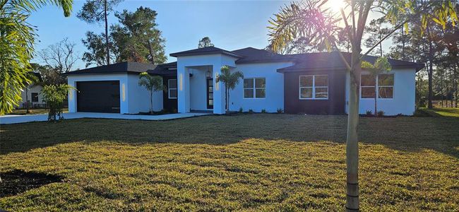 New construction Single-Family house 39683 Royal Trails Road, Eustis, FL 32736 - photo 0