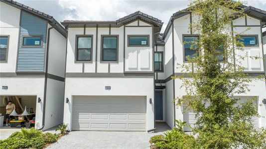 New construction Townhouse house 10443 Ebb Tide Lane, Orlando, FL 32821 - photo 0