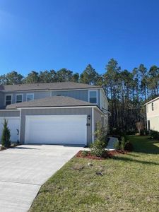 New construction Single-Family house 329 Redbud Road, Palm Coast, FL 32137 - photo 0