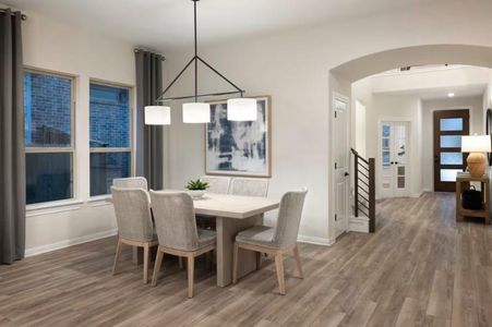 Photo of Pulte model home with same floor plan, not of actual home listed.