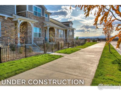 New construction Townhouse house 6965 River Roads Dr, Timnath, CO 80547 - photo 0