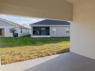 Your living space extends outdoors to a covered lanai.