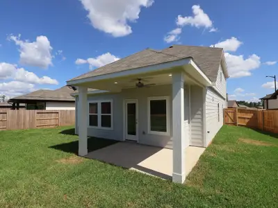 New construction Single-Family house 624 Roaring Falls Dr, Willis, TX 77378 plan Larkspur - Smart Series - image