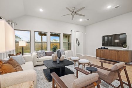 Living Room in a Trinity Ranch Diamond Model in Elgin TX by Trophy Signature Homes