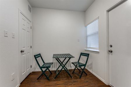 Eating area in kitchen next to pantry