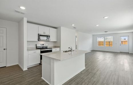 Spacious kitchen with large windows *real home pictured