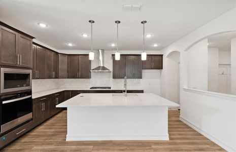 Upgraded kitchen with oversized island*real home pictured