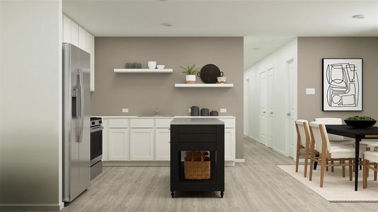 Kitchen featuring sink, white cabinetry, stainless steel appliances, and light hardwood / wood-style flooring