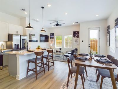 MOVE-IN READY! High-end interior finishes including quartz countertops, big kitchen island, stainless-steel appliances, upgraded cabinets with soft close drawers. FINISHES & FLOOR PLANS WILL VARY! Ceiling fans are not included!