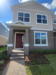 New construction Townhouse house 15258 Blue Peacock Lane, Winter Garden, FL 34787 - photo 0