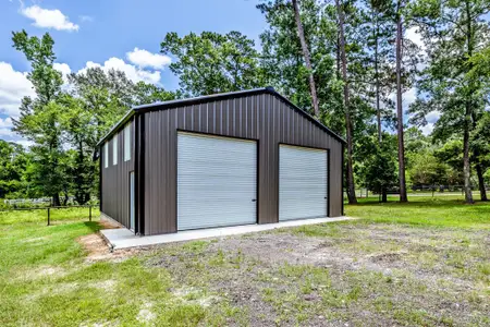 New construction Single-Family house 49 Sandy Creek Farm Rd, New Waverly, TX 77358 - image