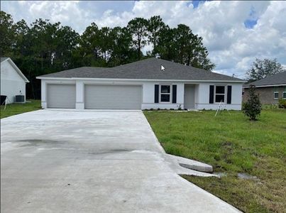 New construction Single-Family house 103 Karas Trail, Palm Coast, FL 32164 - photo 0