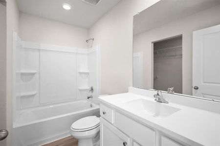 Master Bathroom with tub and shower combo.