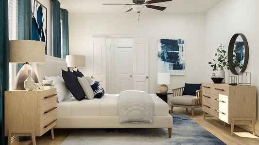 Bedroom featuring hardwood / wood-style floors and ceiling fan