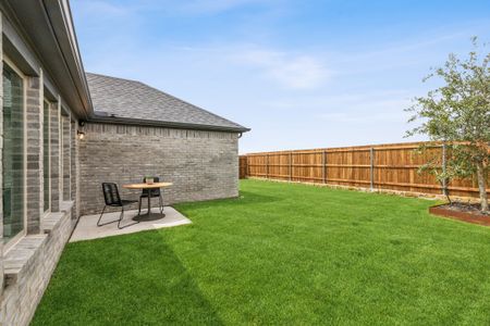 Patio in the Turquoise home plan by Trophy Signature Homes – REPRESENTATIVE PHOTO