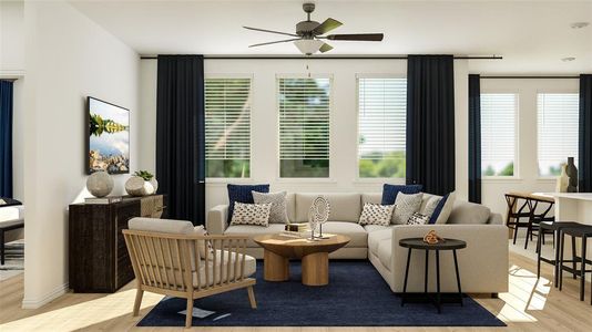 Living room featuring light hardwood / wood-style floors and ceiling fan