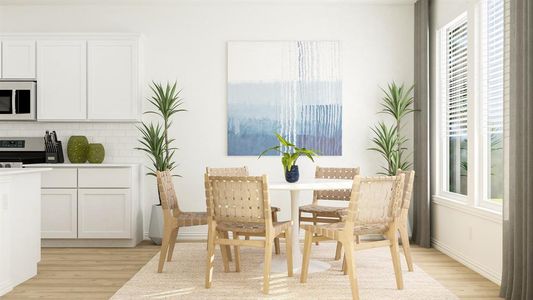 Dining room featuring light hardwood / wood-style flooring and plenty of natural light