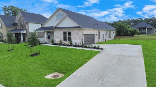 New construction Single-Family house 630 Running Iron Lane, Magnolia, TX 77354 - photo 0