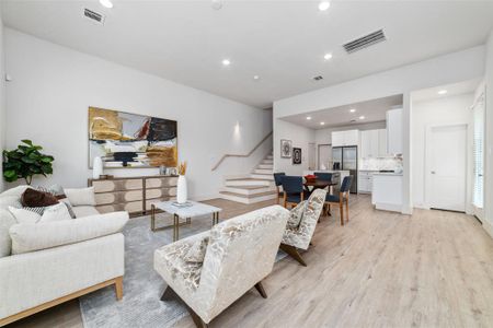 Open Concept Layout Make This Home Perfect For Entertaining And Keeps Everyone Connected. Views Stretch From The Entrance To The Rear Yard In This Sun-Splashed Living Area.