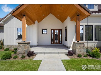 Stunning Entry. Fully Landscaped with Rain Chains.