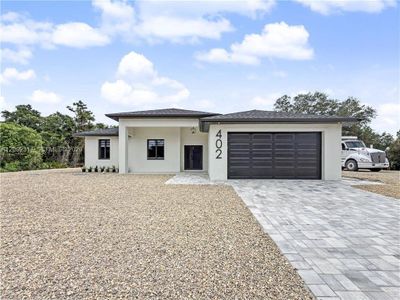 New construction Single-Family house 402 Thompson Ave, Lehigh Acres, FL 33972 - image