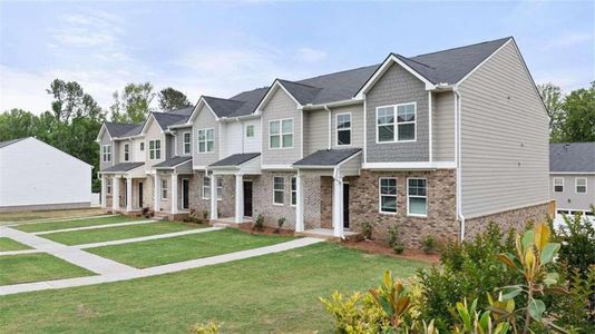 New construction Townhouse house 1009 Cades Walk, Lawrenceville, GA 30045 - photo 0