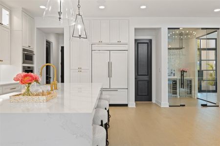 Welcome to Lakeway Luxe in LTISD... Gorgeous Finishes in this new construction home!  The impressive 48” Sub-Zero fridge, elegantly concealed behind custom panels, seamlessly integrates into the kitchen’s aesthetic