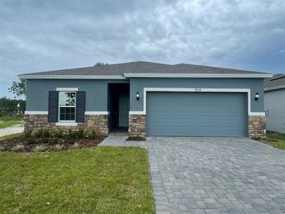 New construction Single-Family house 291 Bottle Brush Trail, Haines City, FL 33844 Bradley- photo 0