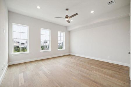 LARGE 15’x19’ primary bedroom. This photo is from a previous build with similar finishes.