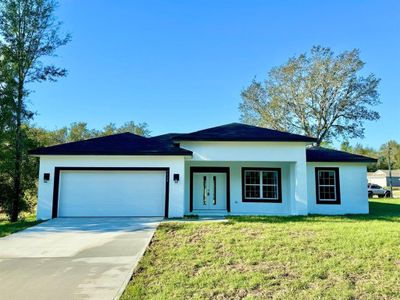 New construction Single-Family house 7924 N Independence Way, Citrus Springs, FL 34433 - photo 0