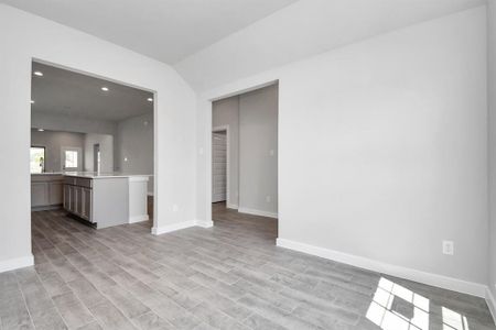 Another view of the spacious dining area. Sample photo of completed home. As-built color and selections may vary.