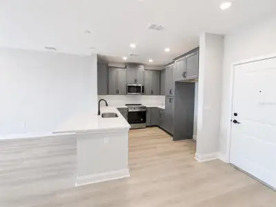 New construction Condo house 7545 Laureate Blvd, Unit 7301, Orlando, FL 32827 plan Aspen with Study - image 7