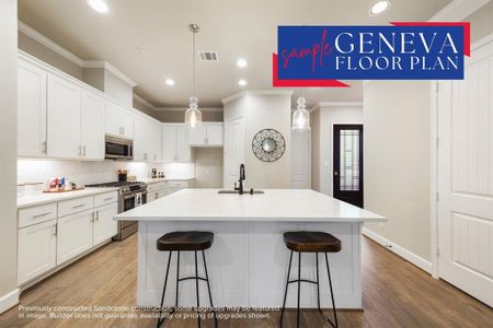 Culinary Paradise: A chef's dream kitchen awaits, featuring direct garage access for seamless transitions from car to culinary creation.