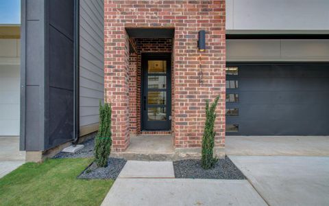 Modern Industrial Architecture at its finest with red brick accents to pay tribute to EaDo's History and red brick warehouses