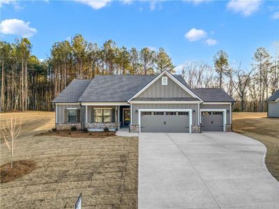 New construction Single-Family house 1139 Cherry Bark Ct, Loganville, GA 30052 plan (GA)The Carson | Front Entry - image