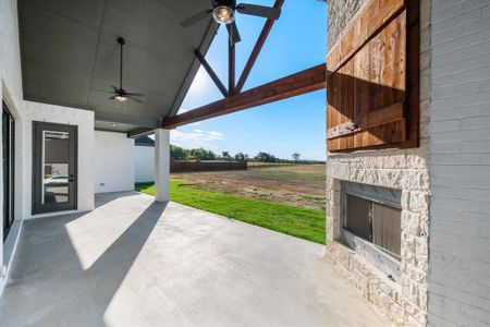 View of patio with ceiling fan