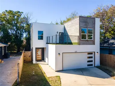 Contemporary house with a balcony and a garage