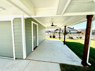 View of patio featuring ceiling fan