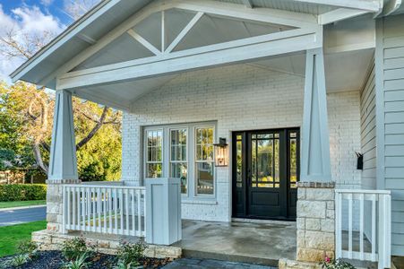 Entrance to property featuring a porch