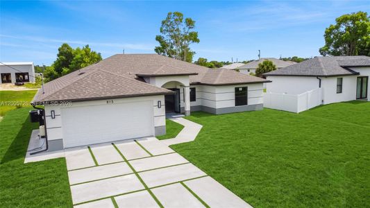 New construction Single-Family house 813 Bell Blvd S, Lehigh Acres, FL 33974 - image