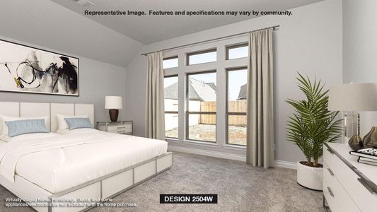 Bedroom with baseboards, light colored carpet, and vaulted ceiling