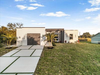 New construction Single-Family house 702 Irving Ave N, Lehigh Acres, FL 33971 - image