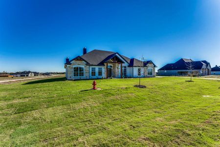 View of front of property with a front lawn