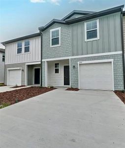 New construction Townhouse house 5963 Chestnut Grove Place, Saint Cloud, FL 34771 - photo 0