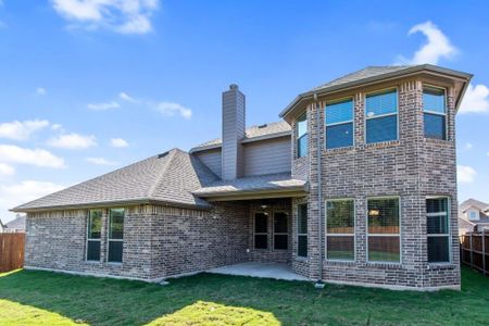 Rear Exterior | Concept 2393 at Mockingbird Hills in Joshua, TX by Landsea Homes