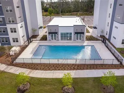 New construction Condo house 5579 Millenia Park Blvd, Unit 211, Orlando, FL 32839 - image