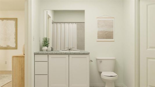 Bathroom with vanity and toilet