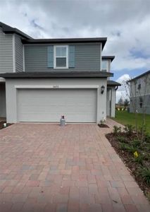 New construction Townhouse house 16452 Happy Eagle Drive, Clermont, FL 34714 - photo 0