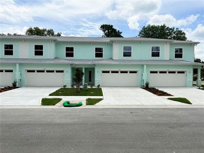 New construction Townhouse house 561 Coronado Cove Road, New Smyrna Beach, FL 32168 - photo 0